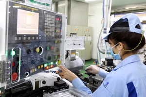 Hoạt động sản xuất của Công ty TNHH INOAC Việt Nam (doanh nghiệp FDI Nhật Bản) ở Khu công nghiệp Quang Minh, Mê Linh, Hà Nội. Ảnh: QUANG PHÚC 