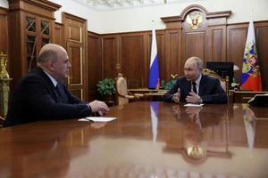 Tổng thống Nga Vladimir Putin và Thủ tướng mới bổ nhiệm Mikhail Mishustin. Ảnh: REUTERS