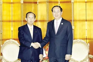 Chủ tịch nước Trần Đại Quang tiếp Tổng thư ký đảng Dân chủ Tự do Nhật Bản Toshihiro Nakai, tại thủ đô Bắc Kinh, Trung Quốc