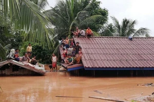 Cảnh ngập lụt sau khi đập thủy điện ở tỉnh Attapeu, Lào bị vỡ ngày 24-7. (Nguồn: THX/TTXVN)
