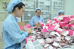 Sản xuất thuốc cung ứng bình ổn thị trường tại Công ty AGIMEXPHARM Ảnh:CAO THĂNG