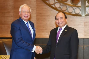 Thủ tướng Nguyễn Xuân Phúc và Thủ tướng Malaysia Najib Razak. Ảnh: VGP