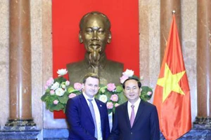 Chủ tịch nước Trần Đại Quang và Bộ trưởng Phát triển Kinh tế Liên bang Nga Maksim Oreshkin. Ảnh: TTXVN