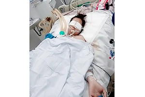 Chị Trần Thị Thúy Hồng đang nằm điều trị tại Bệnh viện Đa khoa Đà Nẵng