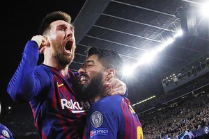 Messi và Suarez cùng ghi bàn giúp Barcelona thắng Liverpool. Ảnh: Reuters