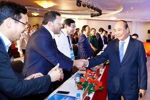 Thủ tướng Nguyễn Xuân Phúc và các đại biểu tham dự hội nghị Xúc tiến đầu tư tỉnh Quảng Ngãi năm 2019. Ảnh: TTXVN