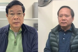 Bị cáo Nguyễn Bắc Son và Trương Minh Tuấn tại cơ quan điều tra. Ảnh: Bộ Công an