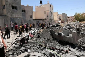 Cảnh đổ nát sau loạt không kích của Israel xuống Dải Gaza ngày 15-5-2021. Ảnh: THX/TTXVN