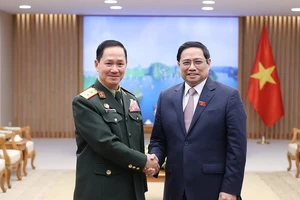 Thủ tướng Phạm Minh Chính tiếp Trung tướng Kham lieng Outhakai Sone, Tổng Tham mưu trưởng Quân đội Nhân dân Lào. Ảnh: TTXVN