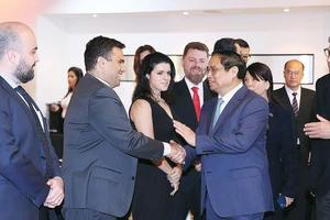 Thủ tướng Phạm Minh Chính với đại diện các doanh nghiệp Brazil. Ảnh: TTXVN