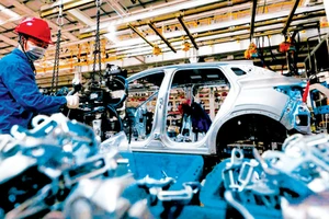Sản xuất ô tô điện BYD tại một nhà máy ở tỉnh Giang Tô, Trung Quốc. Ảnh: EPA