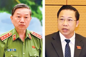 Bộ trưởng Bộ Công an Tô Lâm (trái) và Đại biểu Lưu Bình Nhưỡng, Ủy viên Thường trực Ủy ban Về các vấn đề xã hội. Ảnh: VIẾT CHUNG