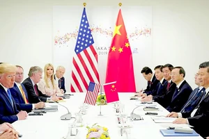 Tổng thống Mỹ Donald Trump gặp Chủ tịch Trung Quốc Tập Cận Bình bên lề Hội nghị Thượng đỉnh Nhóm các nền kinh tế phát triển và mới nổi hàng đầu thế giới tại Nhật Bản tháng 6-2019