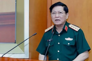 Đại tướng Ngô Xuân Lịch phát biểu khai mạc hội nghị. Ảnh: Dương Giang/TTXVN