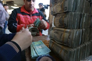 Giao dịch bằng nội tệ ở Iraq