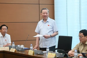 Bộ trưởng Bộ Công an Tô Lâm phát biểu tại tổ ĐBQH về dự thảo Luật Căn cước công dân (sửa đổi). Ảnh: VIẾT CHUNG 