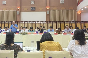 Quang cảnh cuộc họp báo thường kỳ của BHXH Việt Nam chiều 5-6, tại Hà Nội