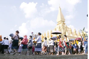 Chính phủ Lào đã quyết định tăng lương cơ bản lần thứ hai trong vòng 4 tháng. Ảnh: TTXVN