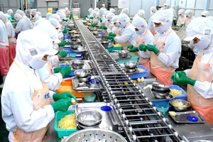 Chế biến thực phẩm xuất khẩu tại KCN Hiệp Phước TPHCM. Ảnh: Cao Thăng