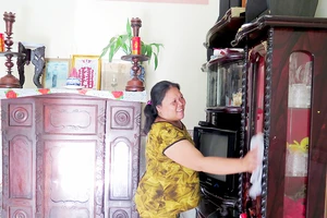 Niềm vui của chị Bùi Thị Kim Thoa trong căn nhà tình nghĩa