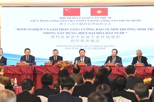 Đoàn Đại biểu Đảng Cộng sản Việt Nam và Đảng Cộng sản Trung Quốc tại buổi khai mạc Hội thảo Lý luận lần thứ 18. Ảnh: VIỆT DŨNG