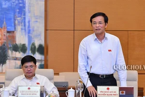 Tổng Thư ký Quốc hội Nguyễn Hạnh Phúc báo cáo về dự kiến chương trình kỳ họp thứ 8 