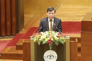 Viện trưởng VKSND tối cao Lê Minh Trí vừa trình bày Báo cáo về công tác của VKSND trong nhiệm kỳ Quốc hội khóa XIV. Ảnh: QUANG PHÚC