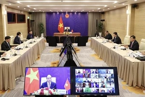Chủ tịch nước Nguyễn Xuân Phúc phát biểu tại Hội nghị Thượng đỉnh trực tuyến về biến đổi khí hậu. Ảnh: QUANG PHÚC
