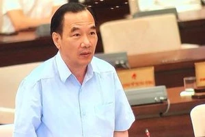 Phó Chủ tịch Ủy ban trung ương Mặt trận Tổ Quốc Việt Nam Ngô Sách Thực trình bày báo cáo tại phiên họp thứ 58 của Ủy ban Thường vụ Quốc hội