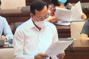 Phó Chánh án Tòa án nhân dân tối cao Nguyễn Trí Tuệ trình bày