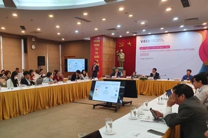 Quang cảnh buổi công bố báo cáo "Dòng chảy pháp luật kinh doanh Việt Nam 2022"