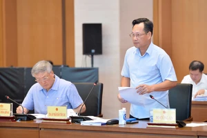 Phó Chánh án TAND Tối cao Nguyễn Văn Tiến trình bày tờ trình