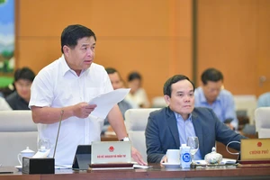 Bộ trưởng Bộ KH-ĐT Nguyễn Chí Dũng báo cáo về kết quả thực hiện, khó khăn vướng mắc trong triển khai 3 chương trình mục tiêu quốc gia trong giai đoạn 2021-2023