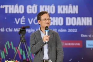 Ông Phạm Chí Quang - Vụ trưởng Vụ Chính sách tiền tệ (Ngân hàng Nhà nước) phát biểu tại buổi tọa đàm