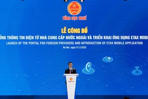 Ông Hồ Đức Phớc, Bộ trưởng Bộ Tài chính phát biểu tại hội nghị công bố thông tin
