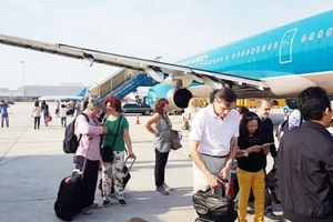 Vietnam Airlines áp dụng mức thu phí sân bay và phí soi chiếu an ninh mới từ 1-10