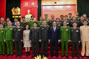 Thủ tướng Chính phủ Nguyễn Xuân Phúc; Bộ trưởng Tô Lâm cùng các đại biểu dự Hội nghị. Ảnh: Bộ Công an