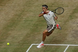 20 năm trước, còn là tân binh, 20 năm sau, Federer đã thành tượng đài Wimbledon
