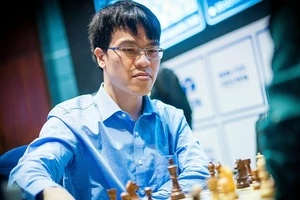 Lê Quang Liêm đã dừng bước dù hòa Magnus Carlsen. Ảnh: CHESS.COM