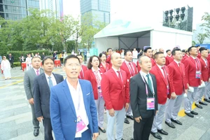 Đoàn thể thao Việt Nam dự lễ thượng cờ trong sáng 22-9 tại Hàng Châu (Trung Quốc). Ảnh: ĐOÀNTTVN