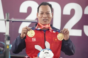 Lực sĩ thể thao người khuyết tật môn cử tạ Lê Văn Công được kì vọng sẽ giành thành tích tốt tại Hàng Châu (Trung Quốc) lần này. Ảnh: CỤCTDTT