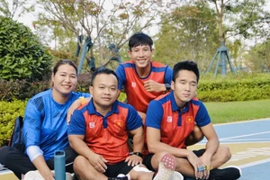 VĐV thể thao người khuyết tật Việt Nam bắt đầu làm quen với điểm tập tại Hàng Châu (Trung Quốc). Ảnh: THÁI DƯƠNG