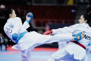 Mỹ Tâm (xanh) đã dự trận tranh HCĐ nhưng cô không thành công và thua đầy tiếc nuối. Ảnh: WKF