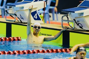 Nguyễn Huy Hoàng tham gia tổ tiếp sức 4x200m tự do của Việt Nam tại giải bơi vô địch thế giới 2024. Ảnh: DŨNG PHƯƠNG