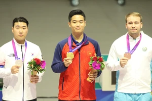 Xạ thủ Phạm Quang Huy đang nỗ lực giành thêm thành tích tốt hơn sau ASIAD 19, đặc biệt là kết quả ở vòng loại Olympic. Ảnh: LƯỢNG LƯỢNG