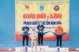 VĐV Nguyễn Thành Lộc (giữa) là gương mặt có chuyên môn tốt nhất đội lặn nam TPHCM thời điểm hiện tại. Ảnh: HCM FINSWIMMING