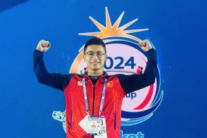 Trịnh Văn Vinh đã có tấm vé Olympic 2024 đầy quan trọng cho cử tạ Việt Nam. Ảnh: H.HÙNG