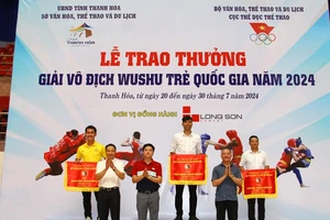 Đội wushu trẻ TPHCM có vị trí nhì toàn đoàn trong nội dung taolu của giải năm nay. Ảnh: BTH