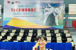 Võ sỹ Phạm Đăng Quang giành HCV cho taekwondo TPHCM ở giải vô địch quốc gia 2024. Ảnh: Đ.QUANG