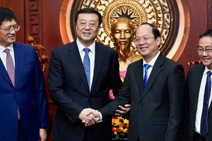 Ho Chi Minh City, Urumqi (China) forge ties